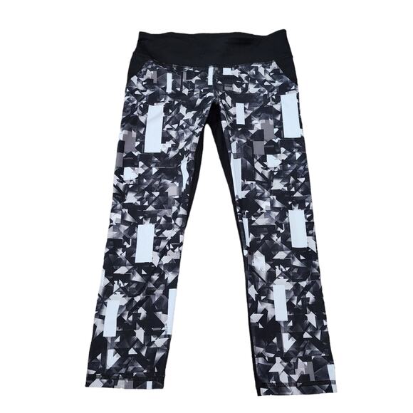 Under Armour Pants - Under armour black and Grey women's size  medium crop leggings